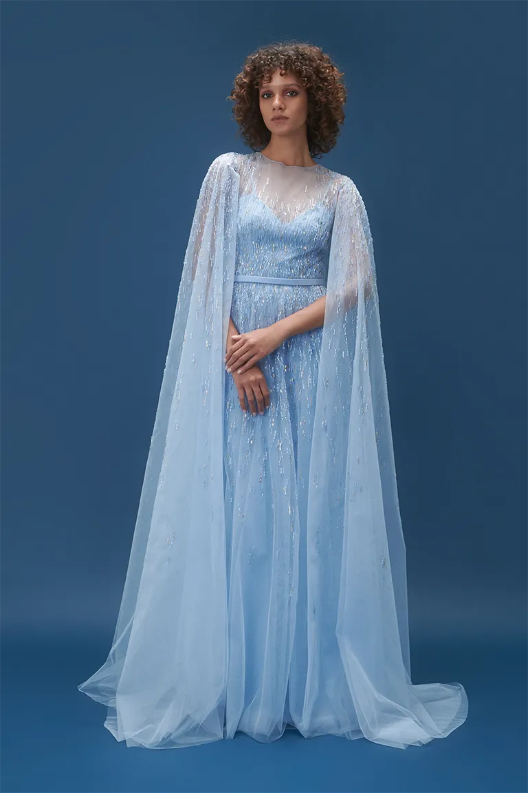 mother of the bride, beadwork, blue dress, embroidery, beading, flowy fully embellished cape dress,capes dress, tulle dress, ball gown, long dress, tulle cape, evening dress, beading dress, red carpet dress, ready to wear designer, evening dress Dubai, buy dress Dubai, fashion designer Dubai, Autumn-Winter collection, gala dress