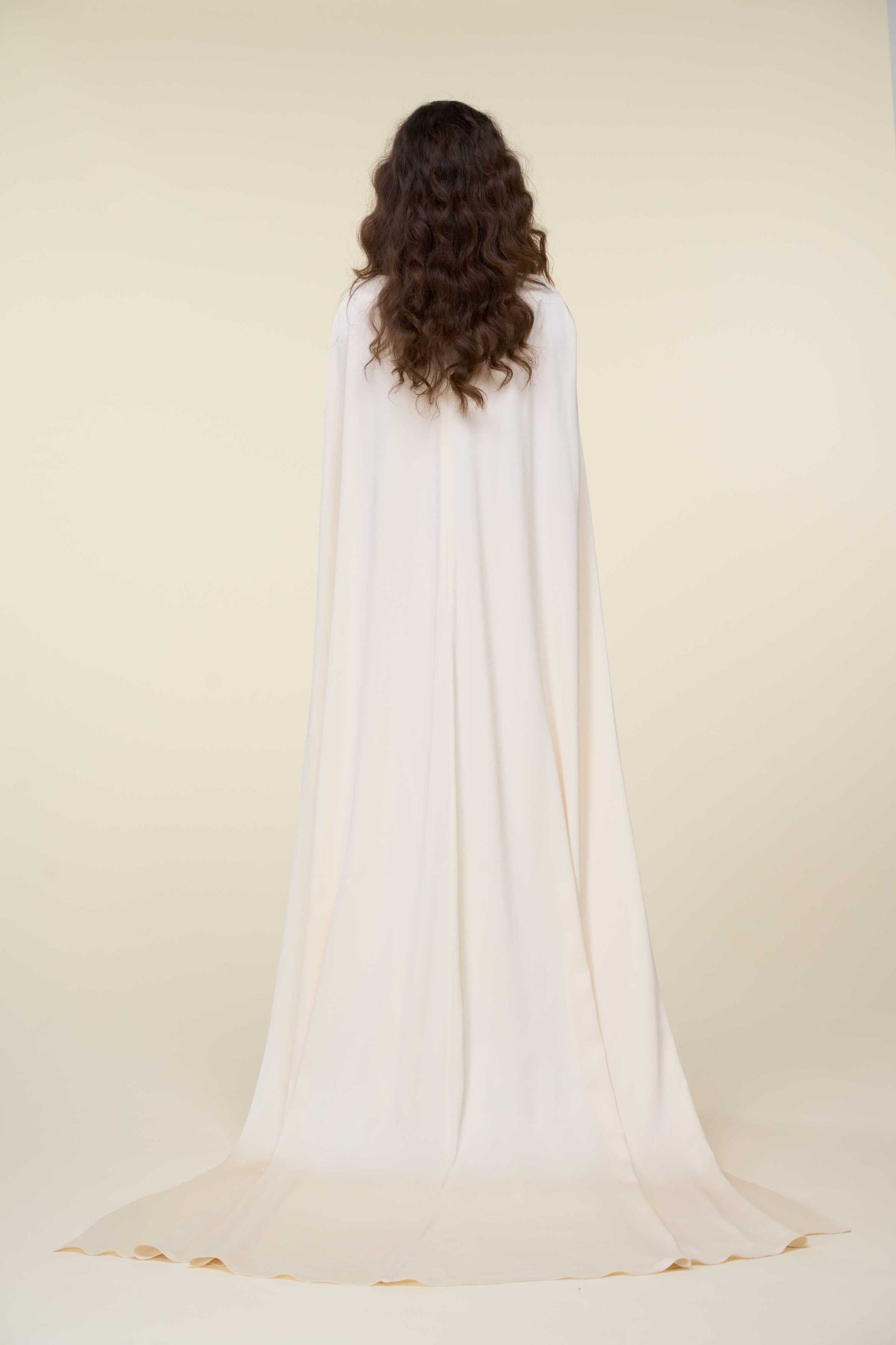 Sequin Tubino Dress With Asymmetrical Cape Overlay.