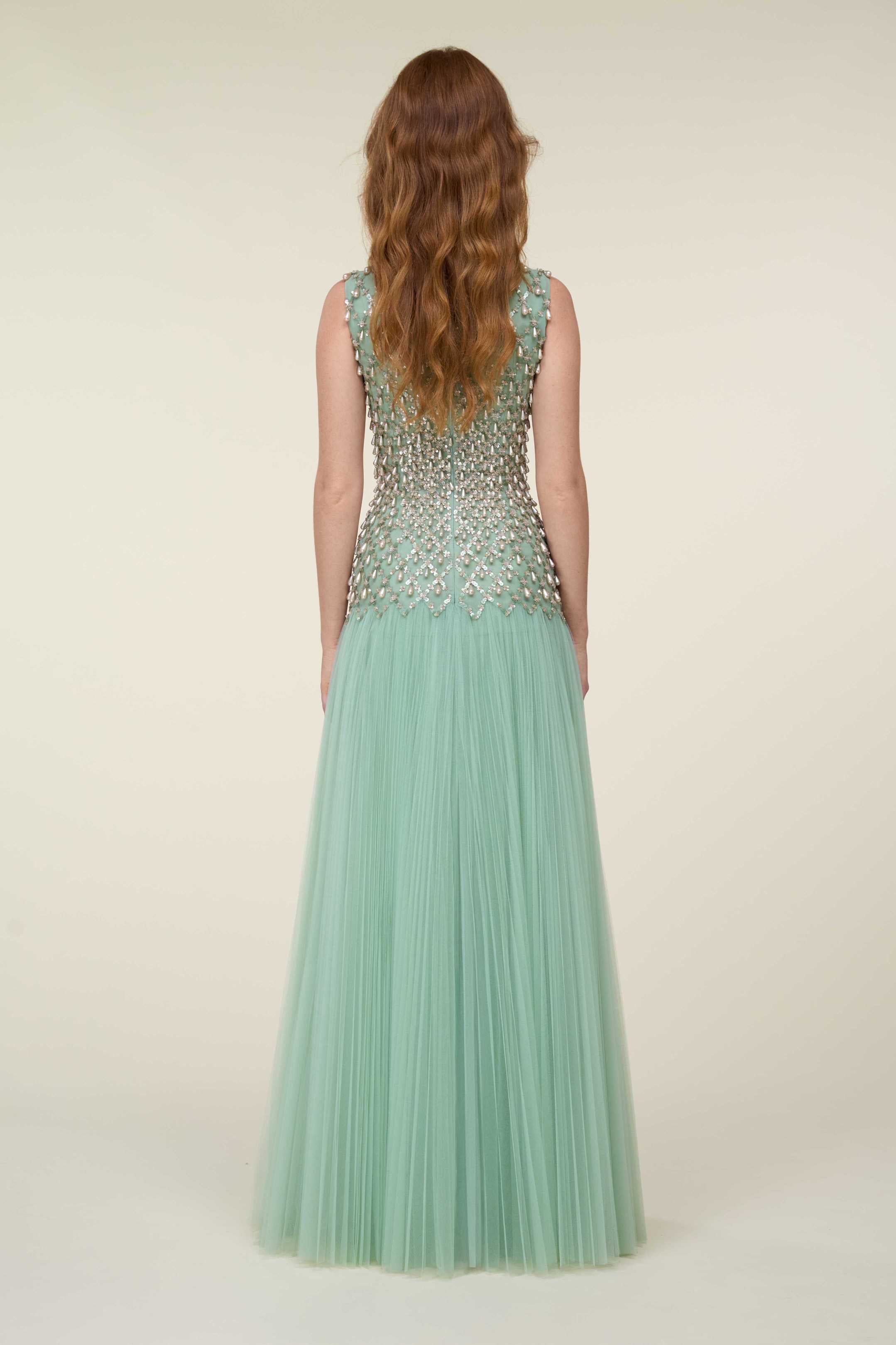 Fully Beaded Gown With Pleated Tulle Skirt.