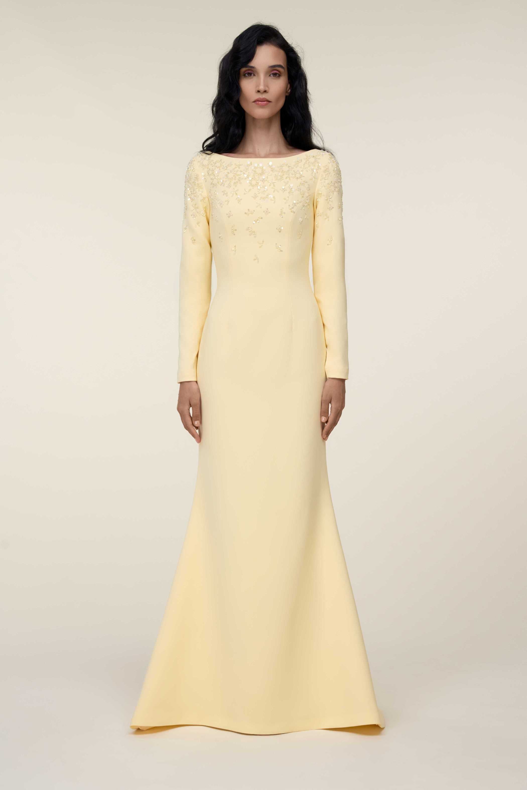 Long-Sleeved Mermaid Gown With Embellished Bodice Detail.