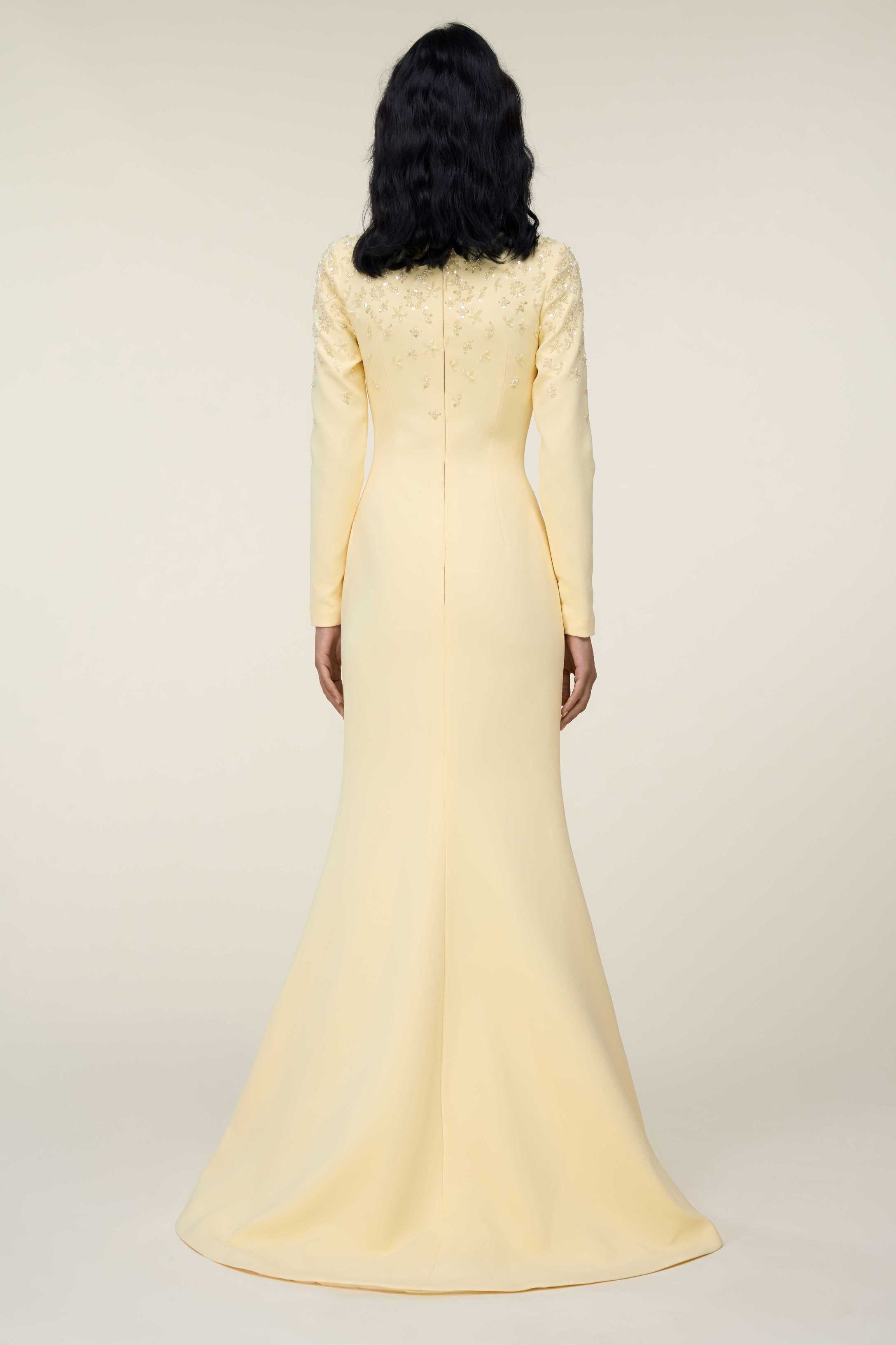 Long-Sleeved Mermaid Gown With Embellished Bodice Detail.