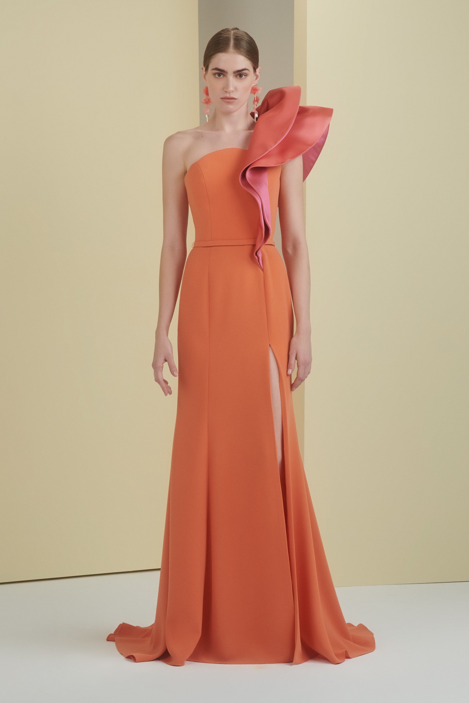 long dress with slit, dress with slit, mermaid dress, orange dress, full length, tangerine dress, ruffle dress, colour block dress, long dress, evening dress, fitted dress, one shoulder dress, asymmetrical neckline dress, red carpet dress, strapless dress, ready to wear designer, evening dress Dubai, buy dress Dubai, fashion designer Dubai, SS24 collection, Spring summer collection, gala dress