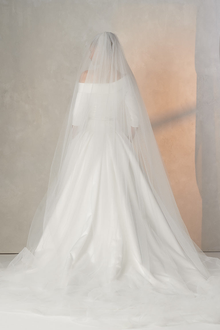 Cathedral tulle veil funnel shape