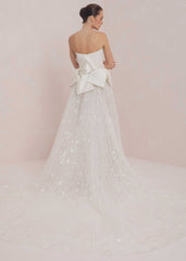 Strapless Gown With Fully Beaded Skirt And Bows