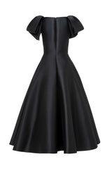 Tea-Length Voluminous Dress With Bows And Ribbons