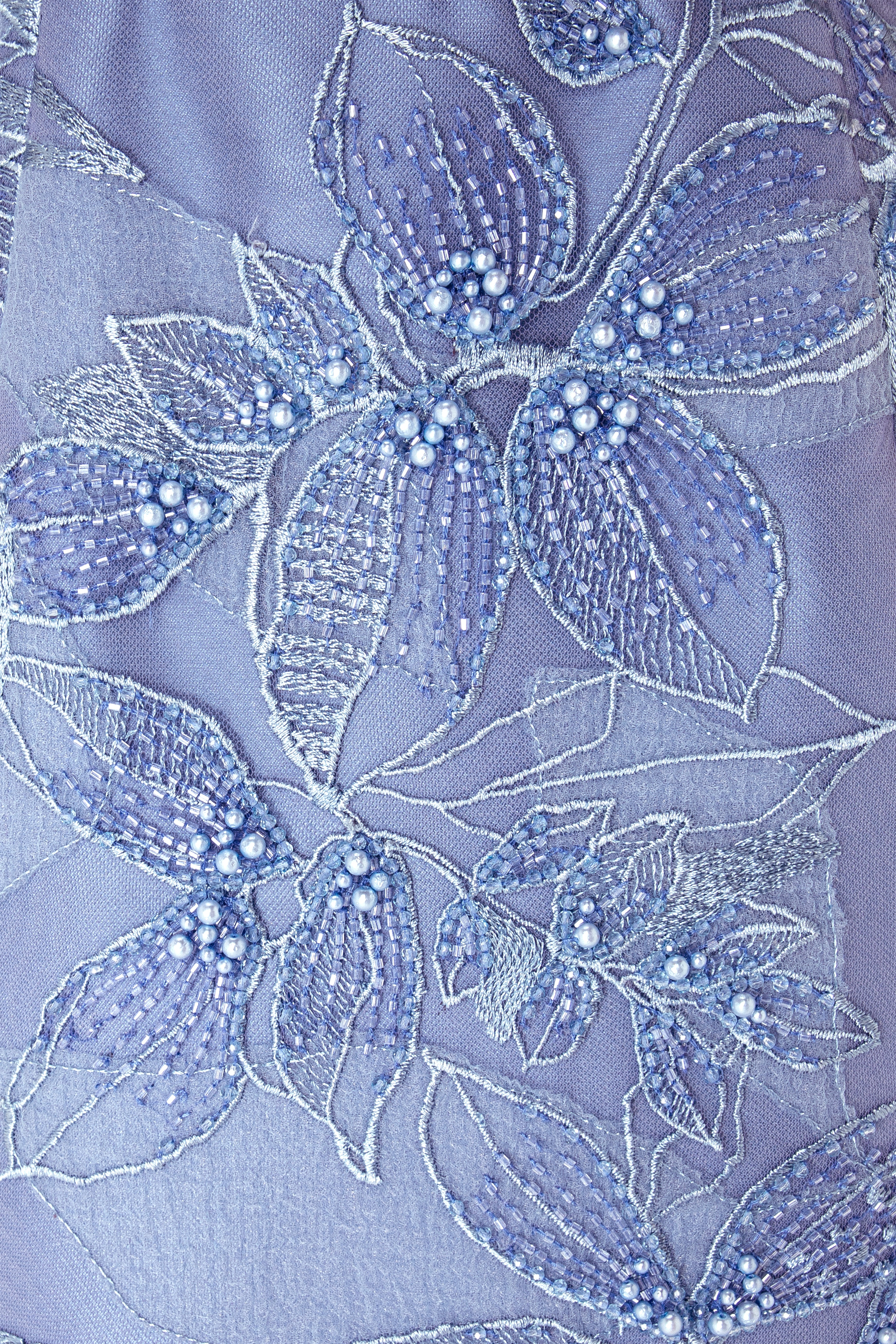 Embroidered gown with a cape