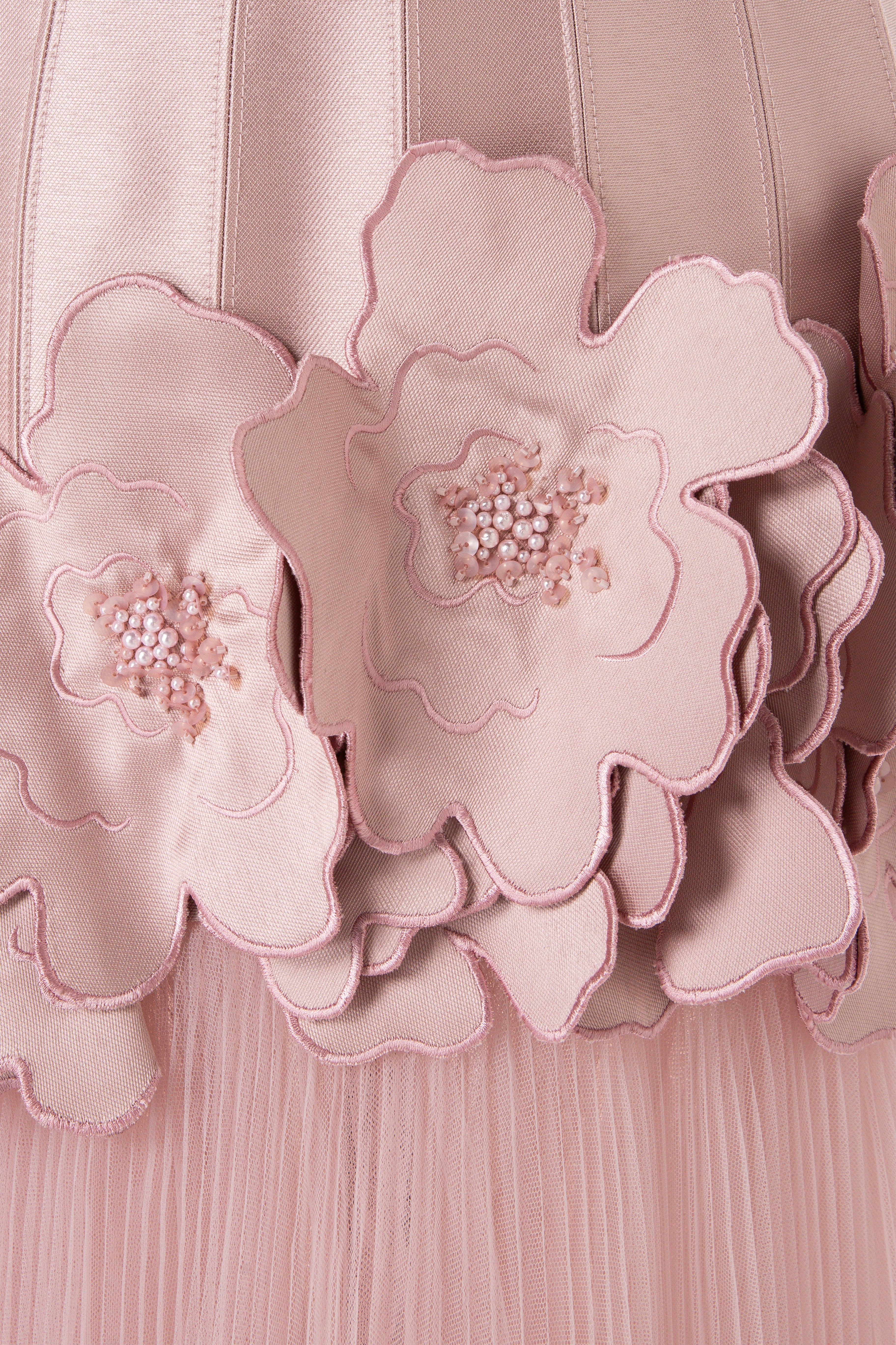 Strapless Gown With Beaded 3D Floral Appliqués And A Pleated Tulle Skirt.