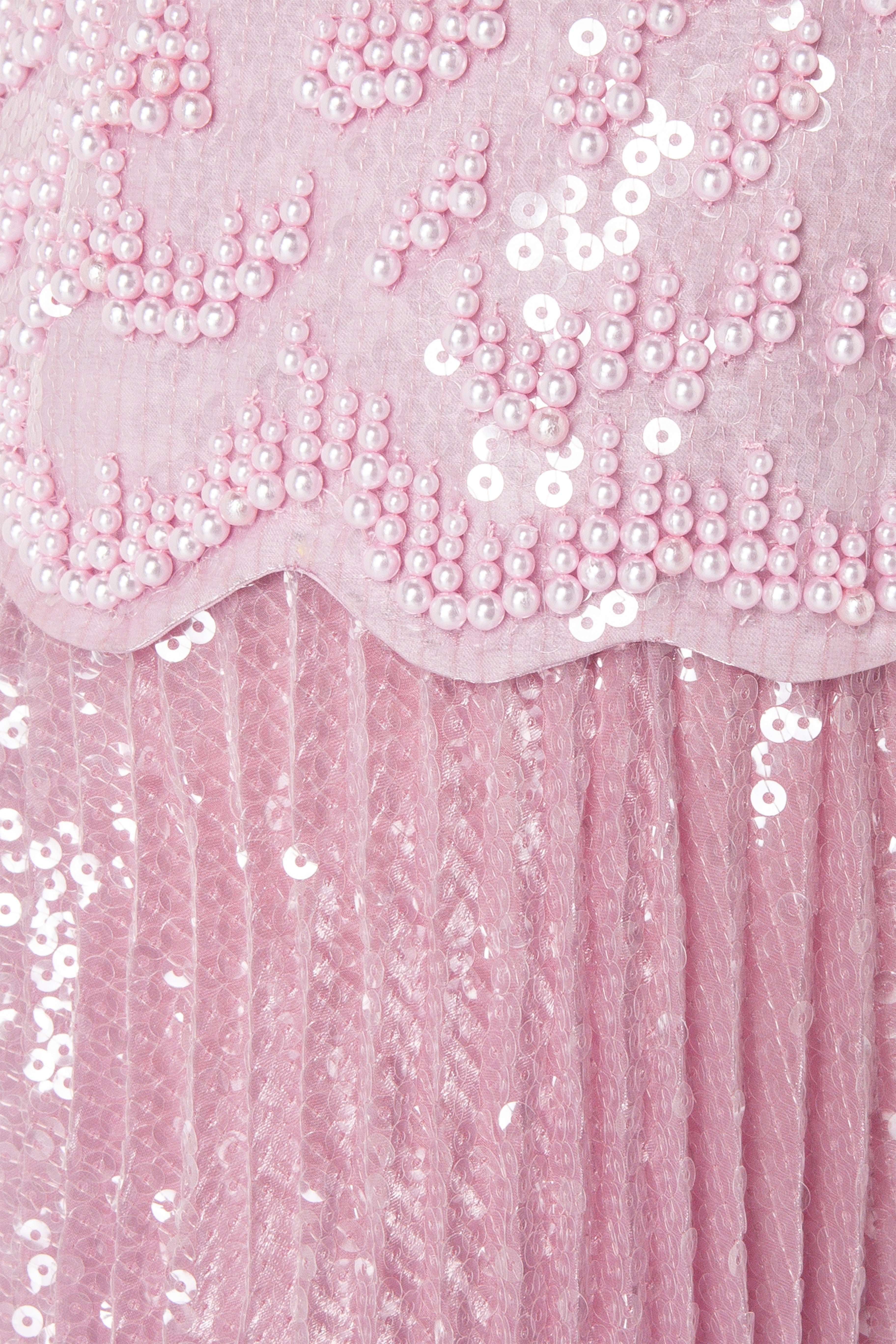 Sequin Gown With Peplum And Sunray Pleated Skirt.