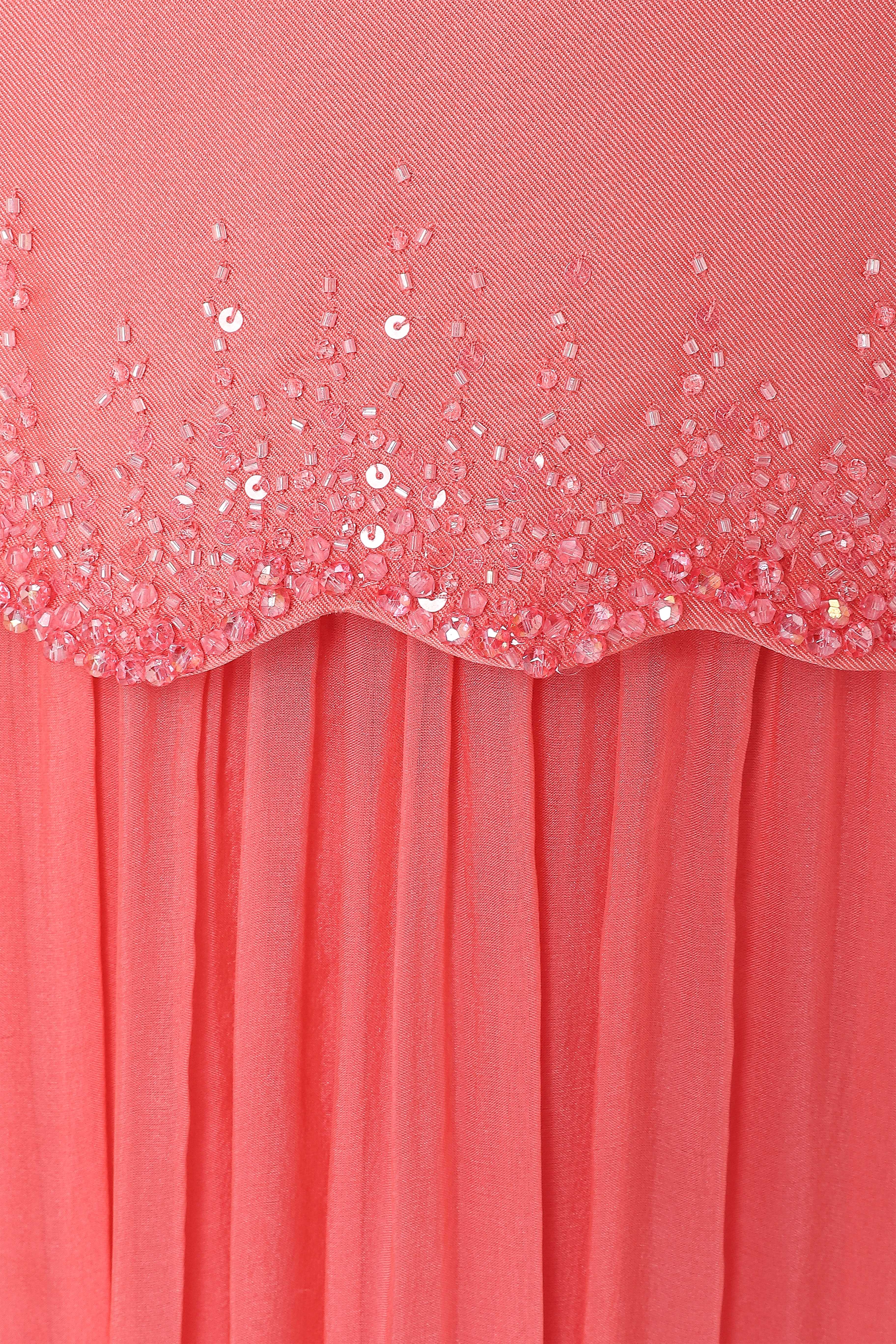 Strapless Gown With Beaded Peplum Detail And Belt.