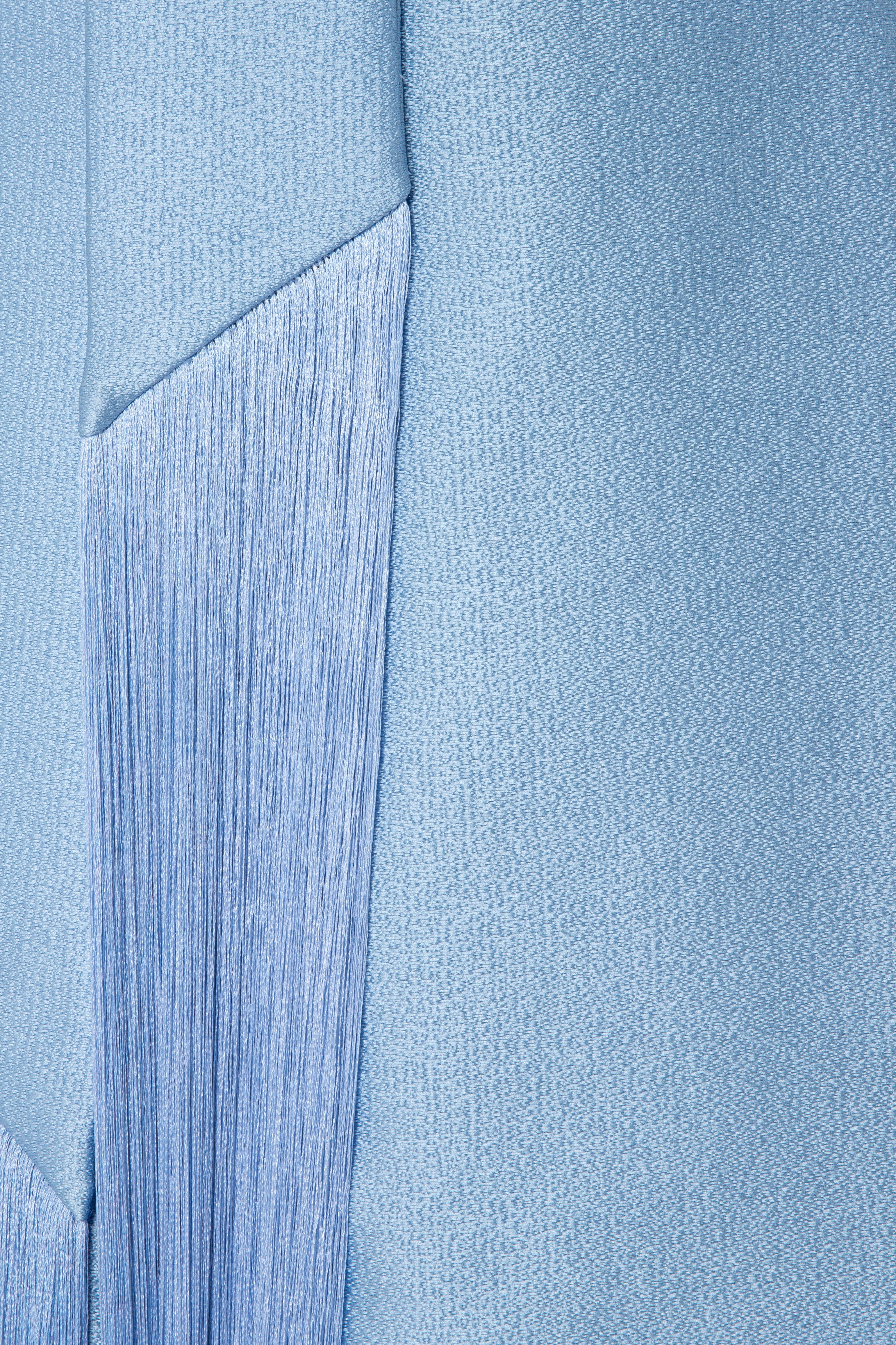 V-Neck Gown With Puff Sleeves And Fringed Sash Belt.