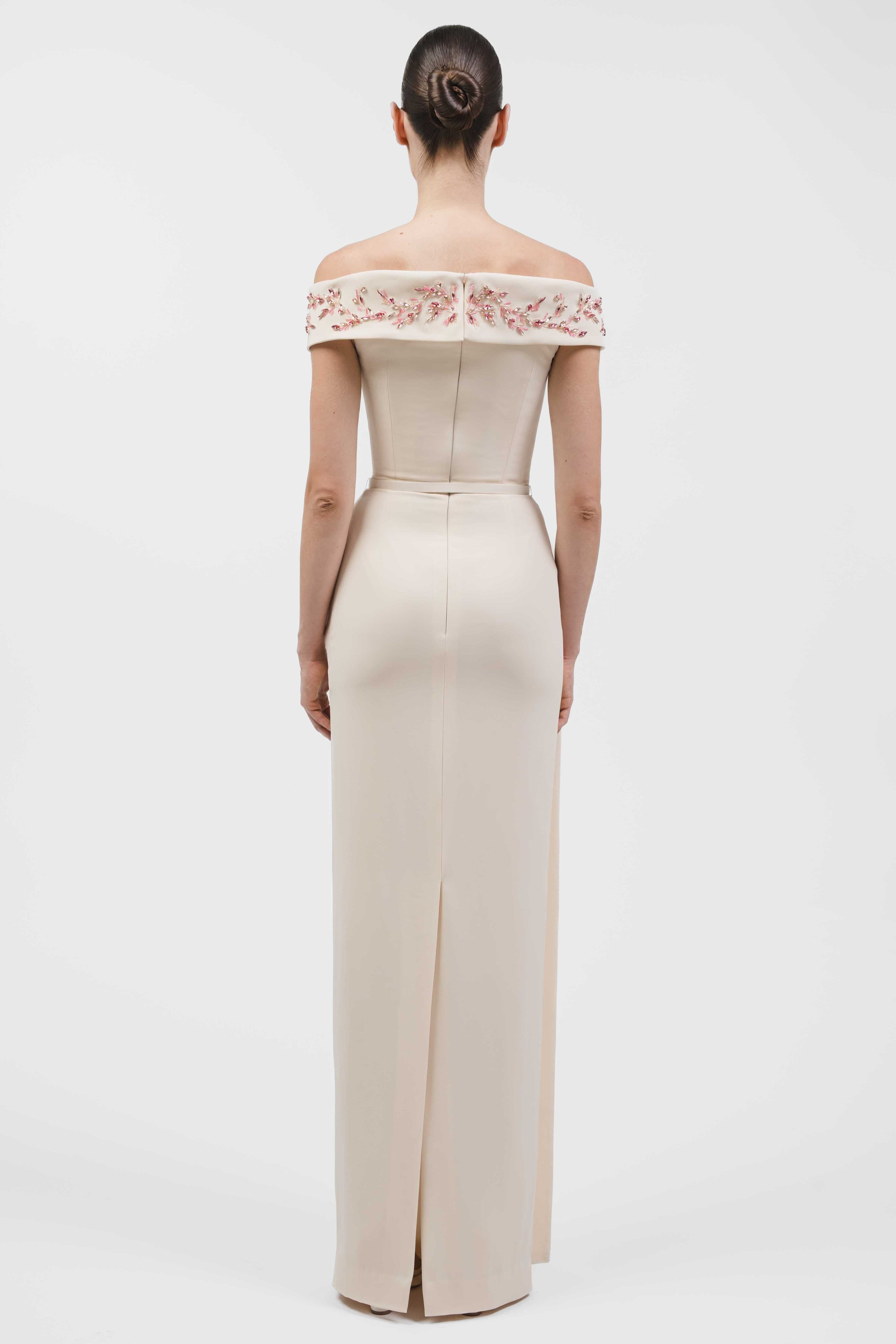 Off-Shoulder Column Gown With Sculptural Peplum, Crystal Embellishment.
