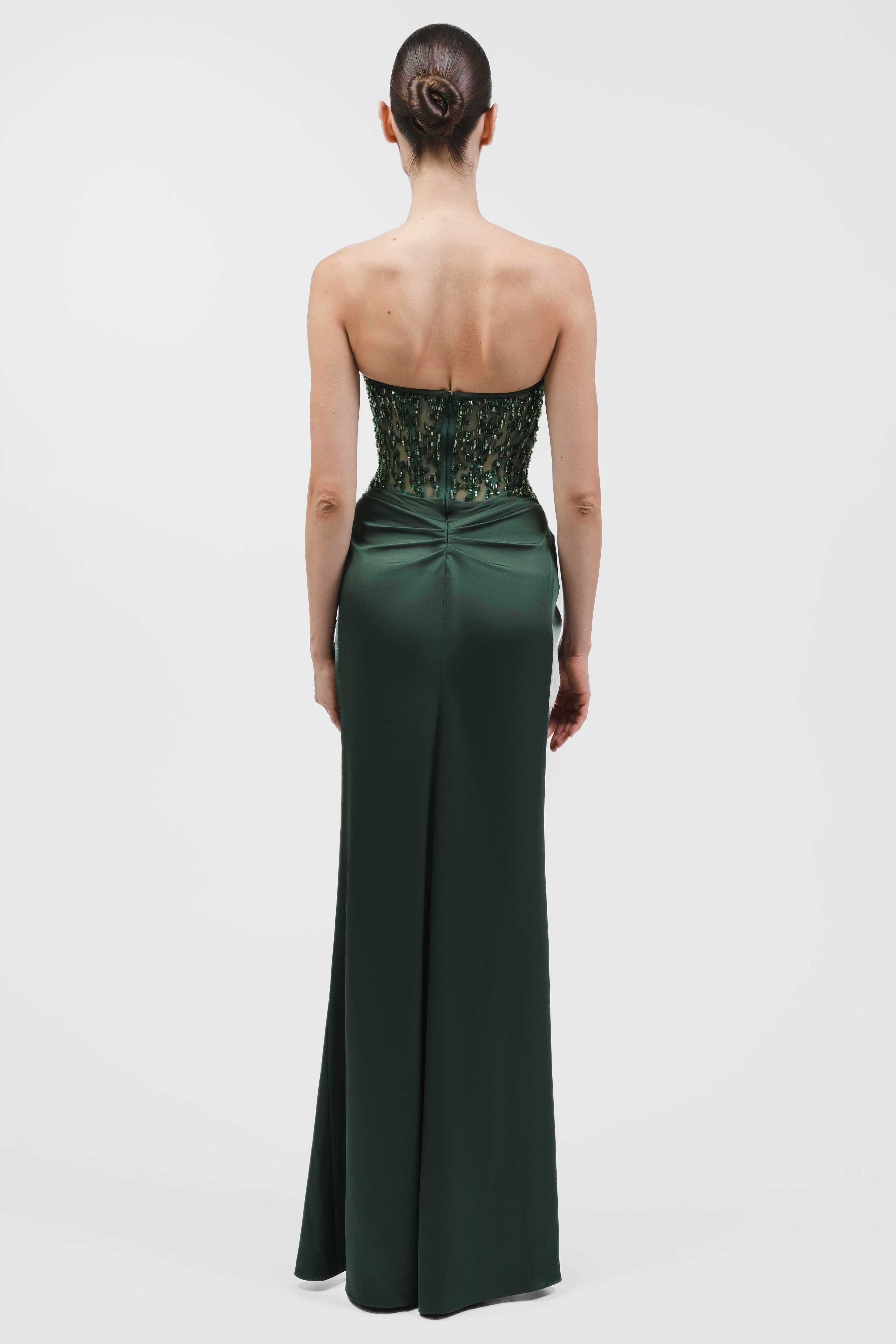 Strapless Beaded Corset Gown With Draped Skirt And Front Slit.