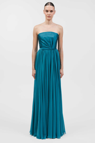 Strapless Asymmetrically Draped Muslin Gown With Flowing Silhouette And Belt.