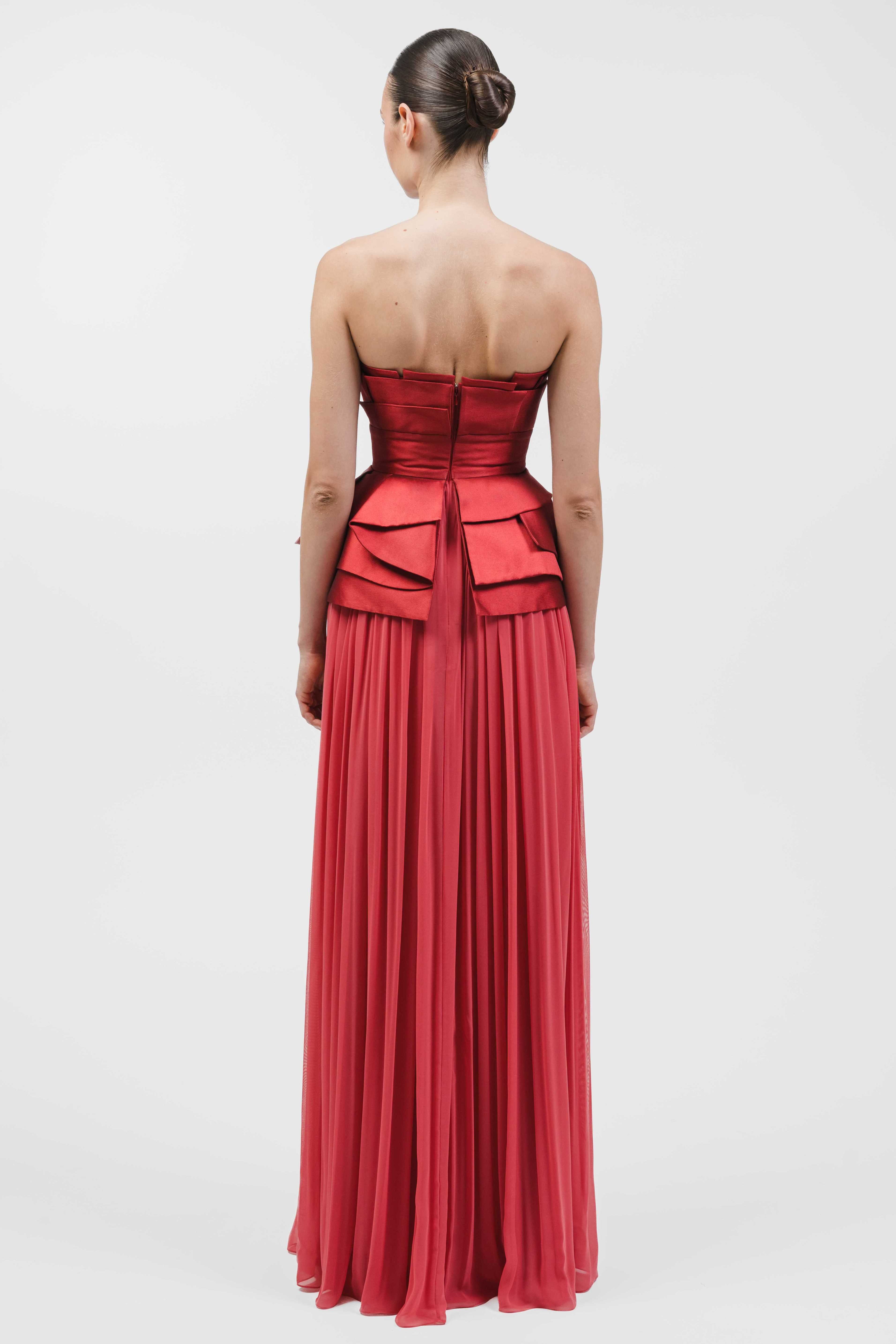 Strapless Gown With Multi-Layered Geometric Bodice With Peplum And Draped Skirt.