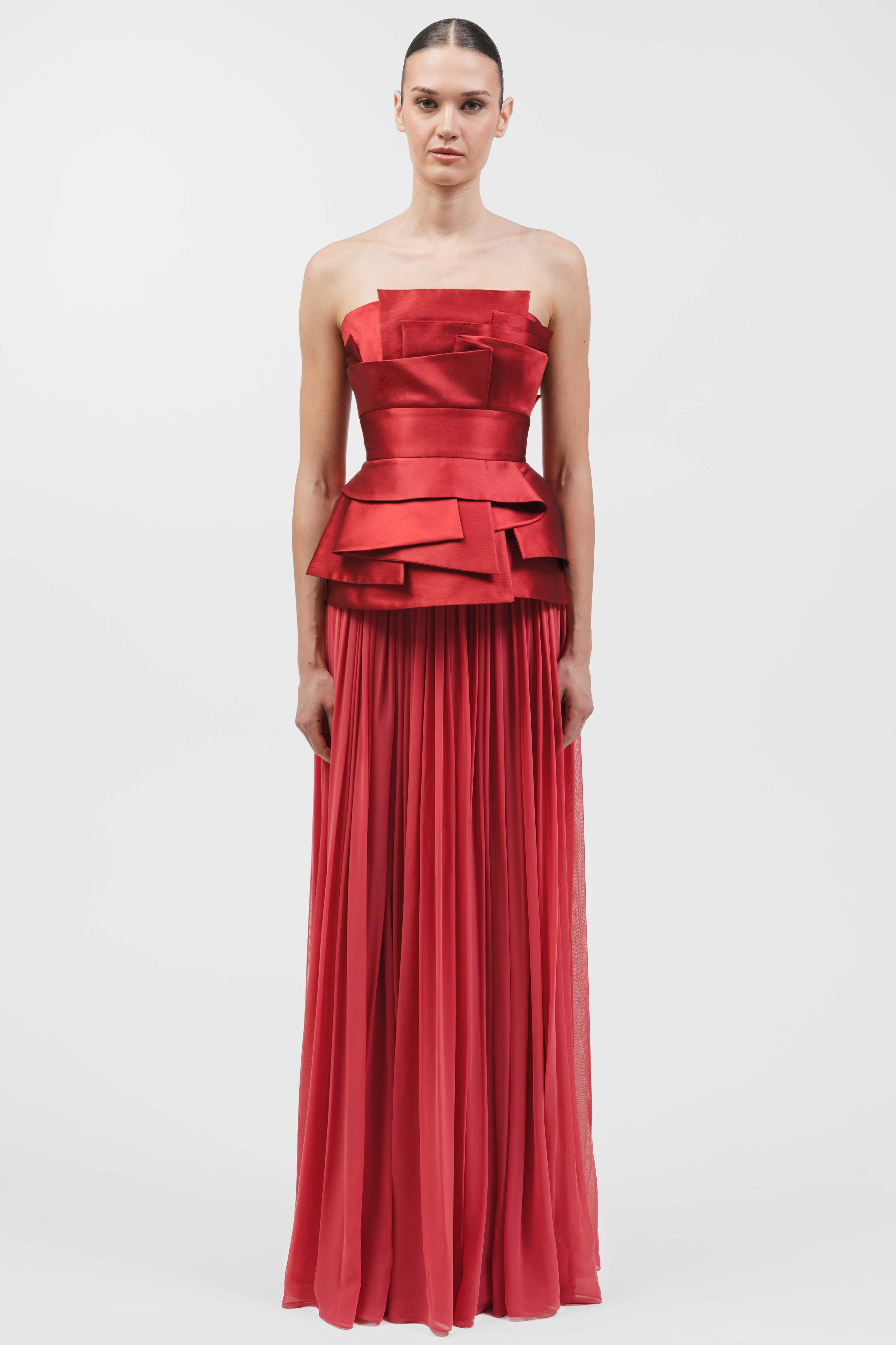 Strapless Gown With Multi-Layered Geometric Bodice With Peplum And Draped Skirt.