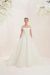 Intricately Embroidered Wedding Gown With A Voluminous Silhouette