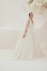 Sophisticated Halter-Neck Wedding Gown Adorned With Intricate Embroidery And Embellishments