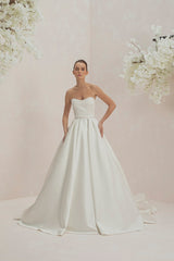 Strapless Gown With Structural Pleated Skirt | Bolero With Asymmetrically Placed Decorative Bows