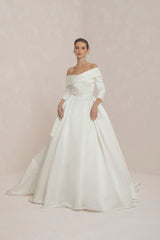 Asymmetric Off Shoulder Wedding Gown With Voluminous Skirt