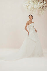 Wedding Gown Fully Adorned With Lines Of Sequins, Showcasing Asymmetric Soft Structured Folds