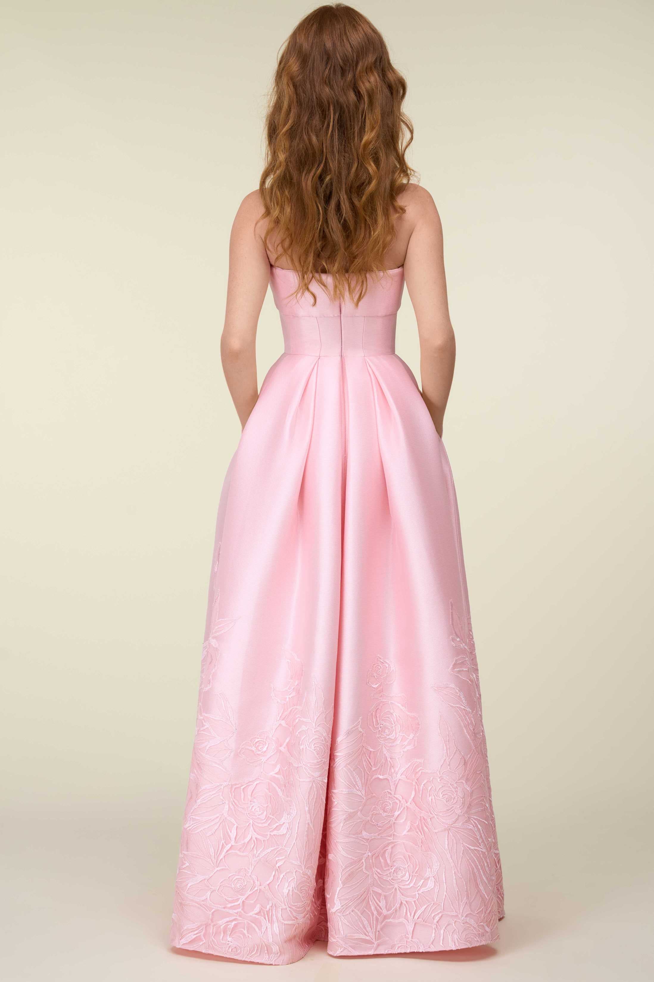 Strapless Gown With Twisted Bodice And Embroidered Skirt.