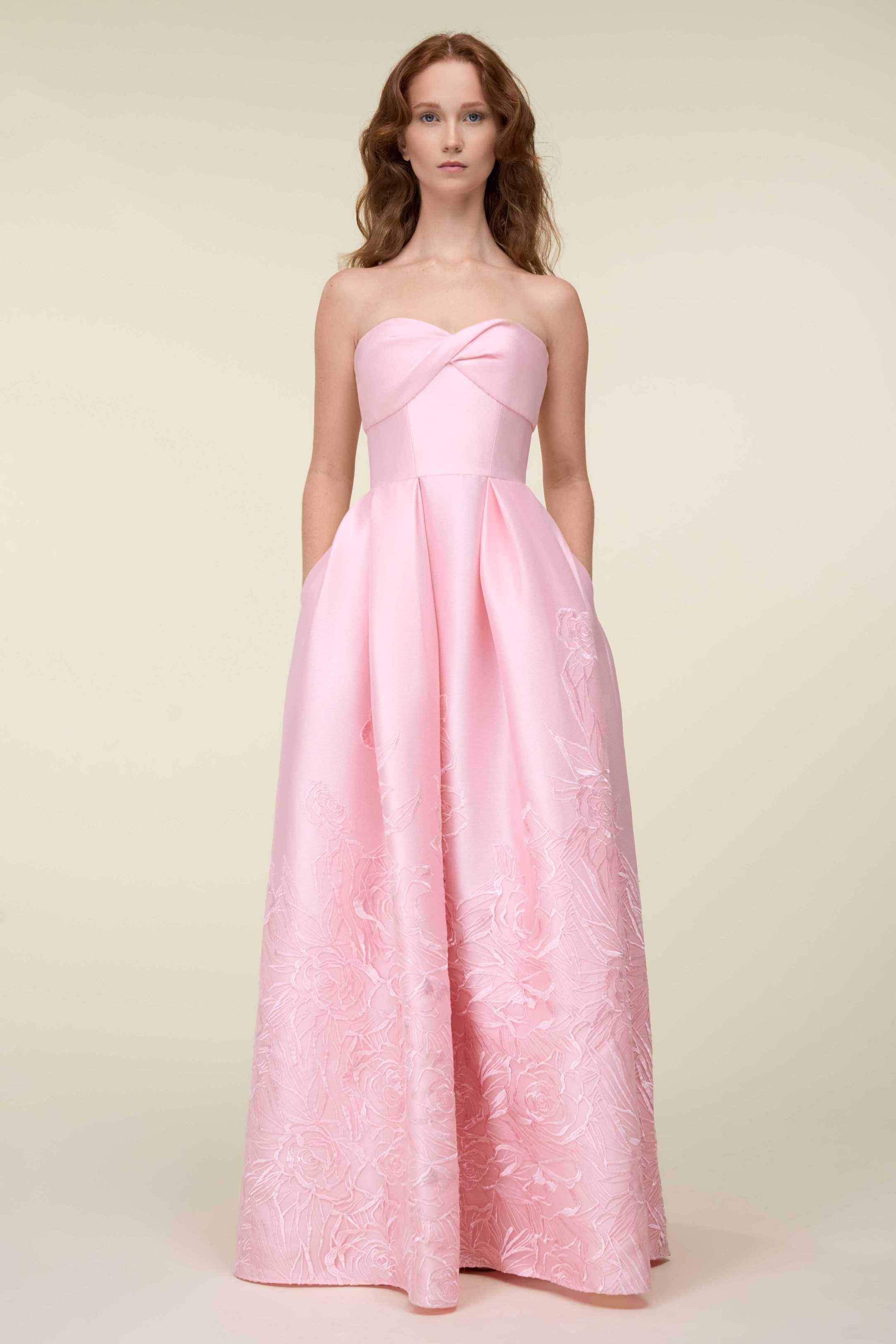 Strapless Gown With Twisted Bodice And Embroidered Skirt.