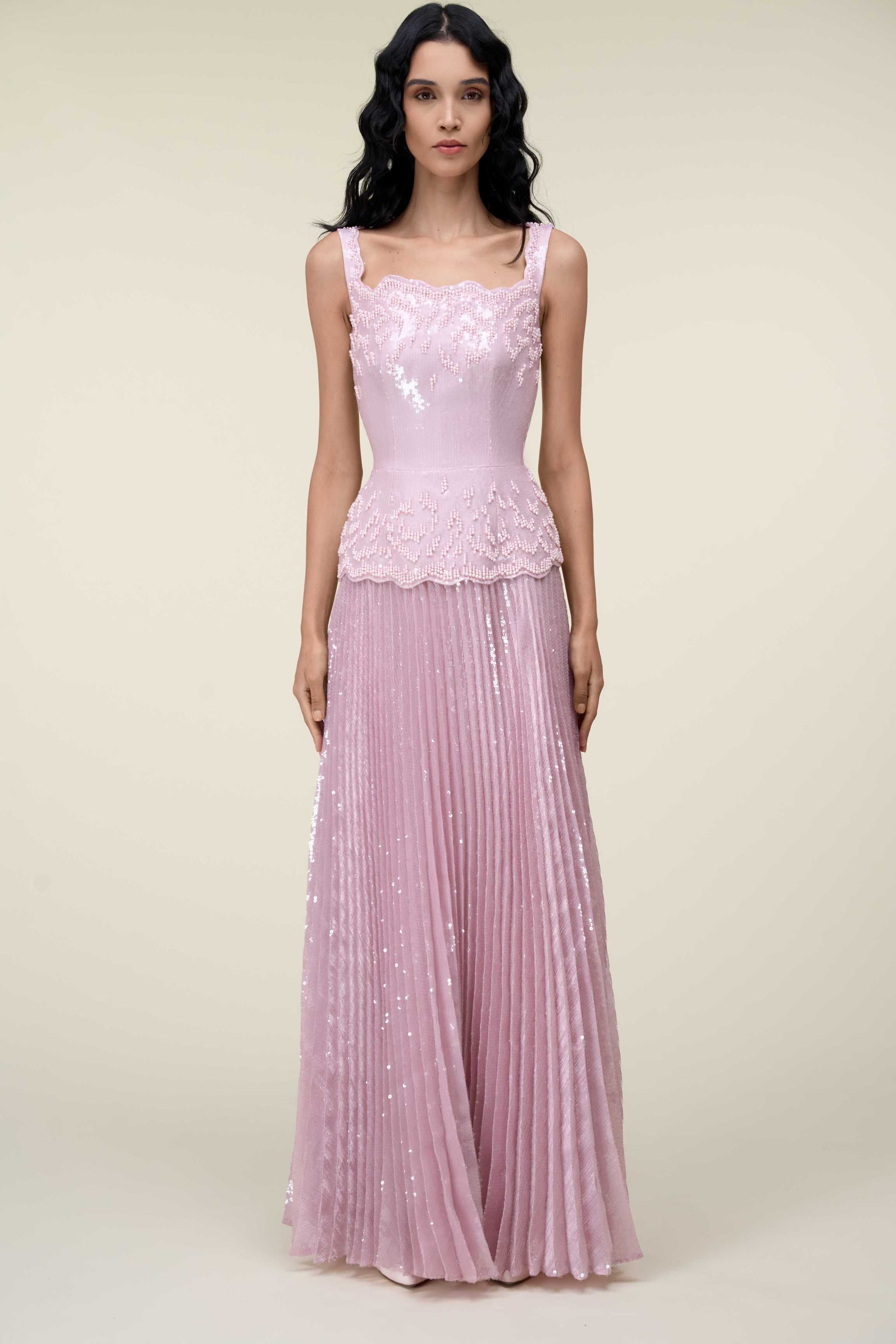 Sequin Gown With Peplum And Sunray Pleated Skirt.