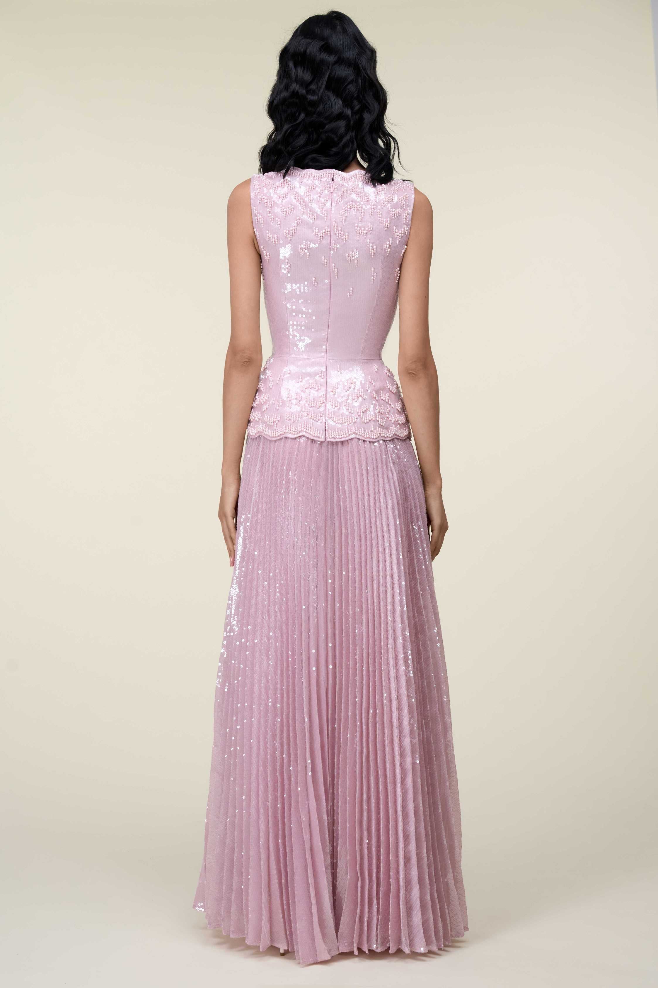 Sequin Gown With Peplum And Sunray Pleated Skirt.