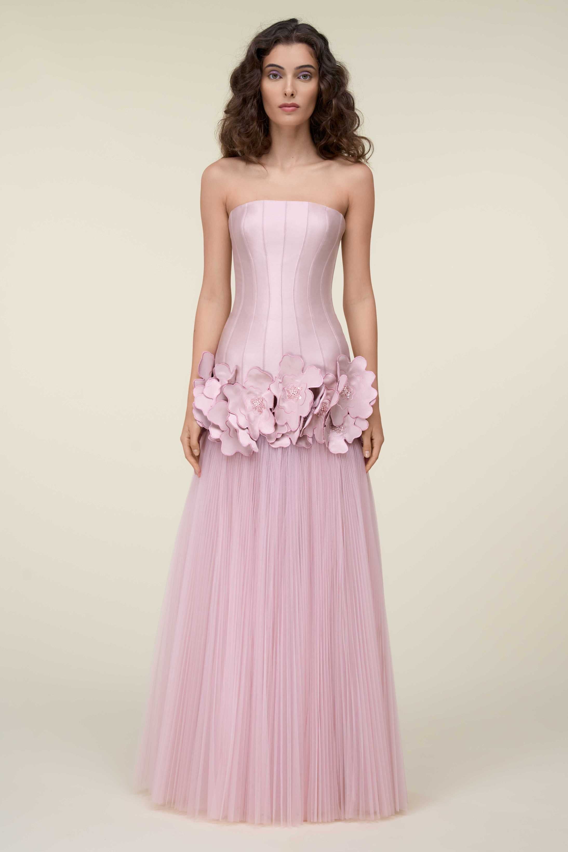 Strapless Gown With Beaded 3D Floral Appliqués And A Pleated Tulle Skirt.