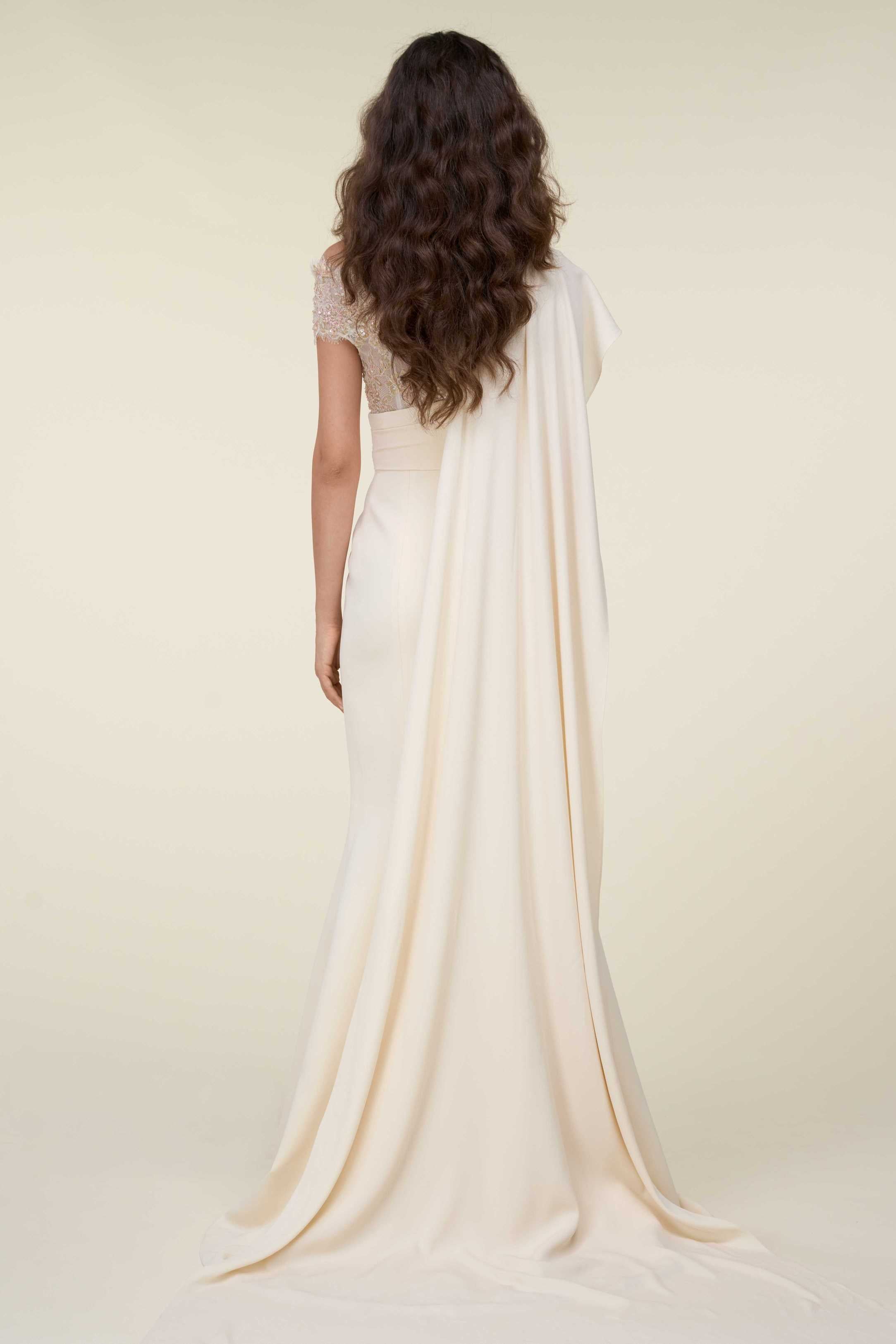 Asymmetric Draped Gown With Fully Beaded Lace Illusion Detail.
