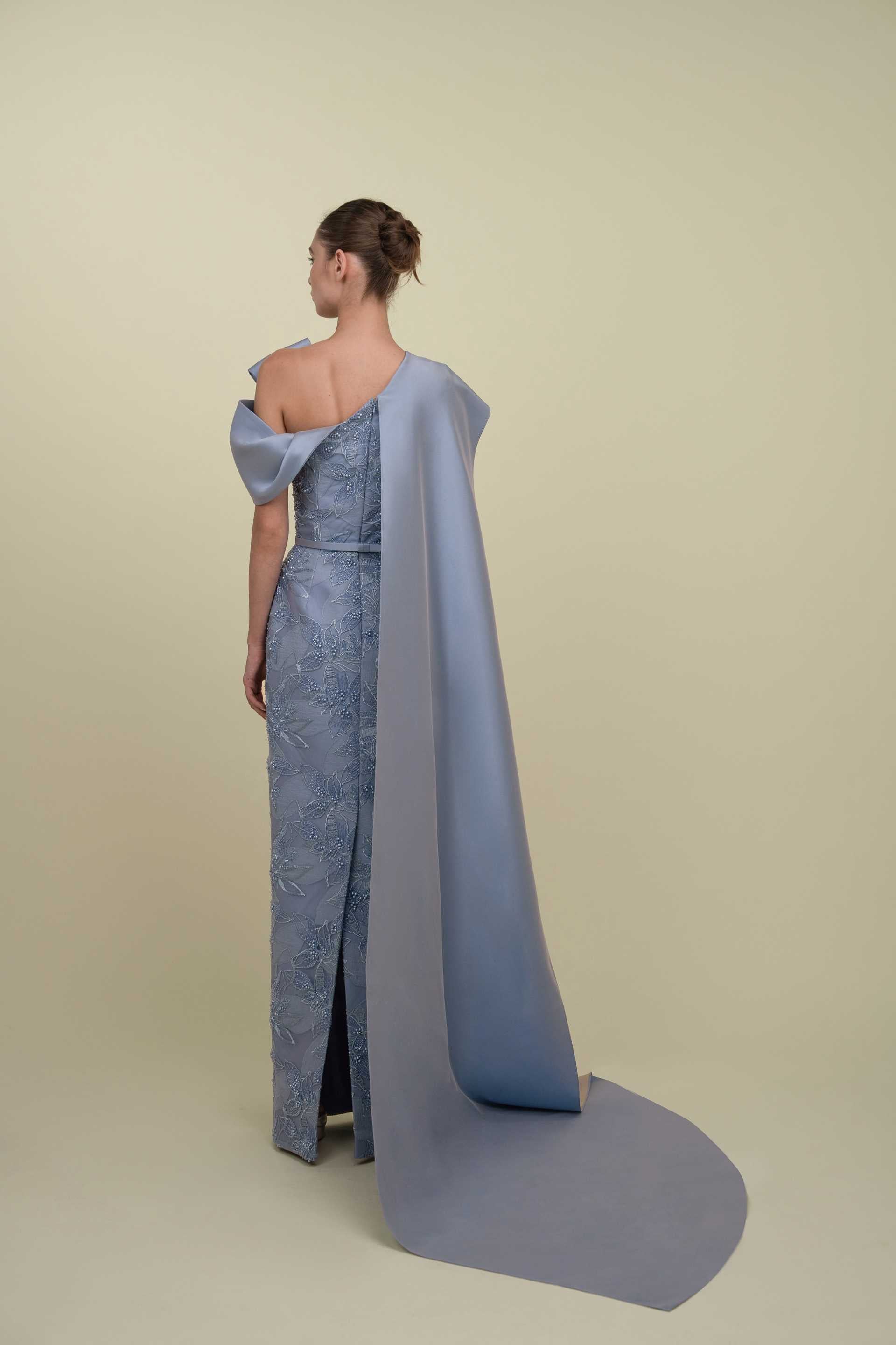 Embroidered gown with a cape