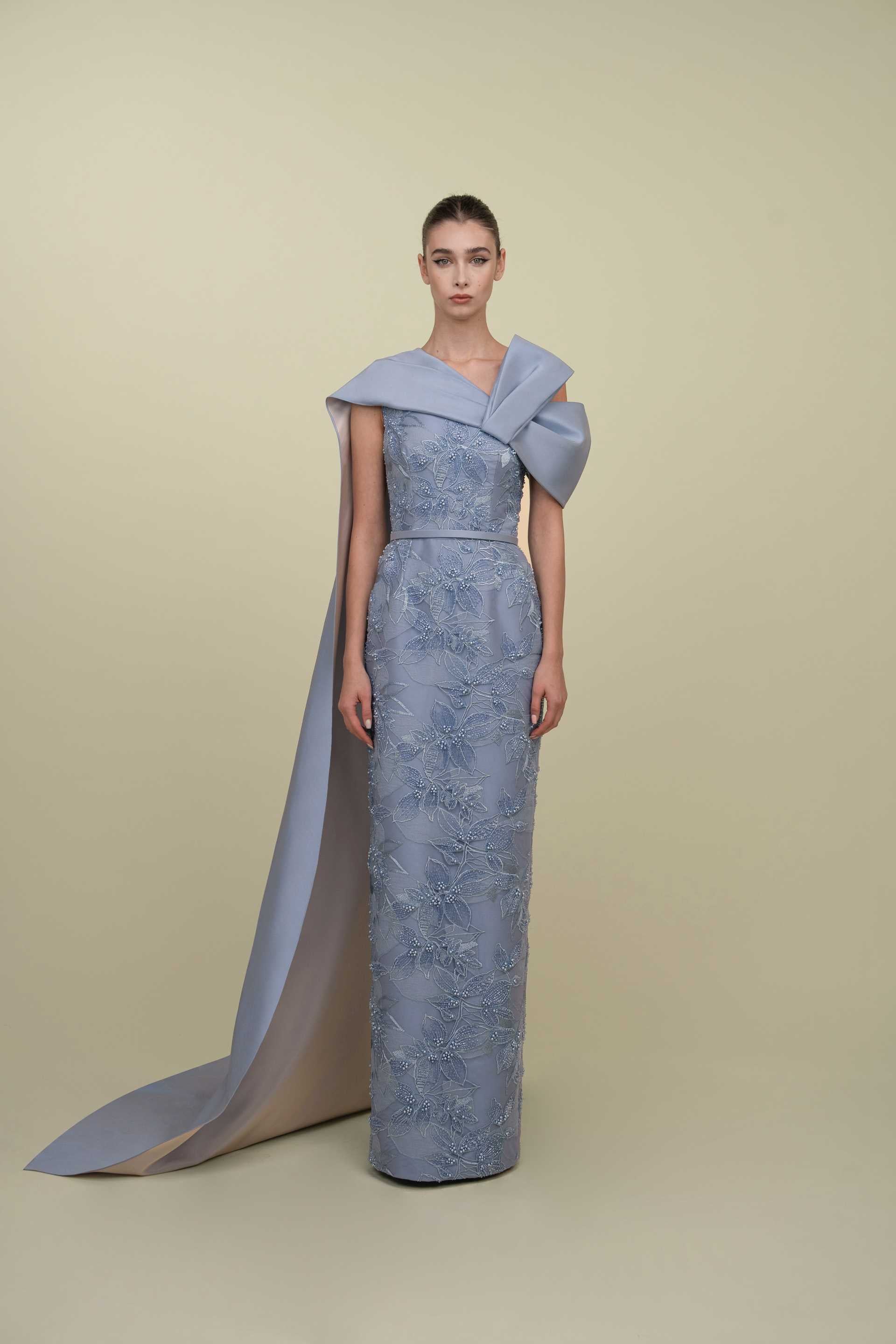 Embroidered gown with a cape