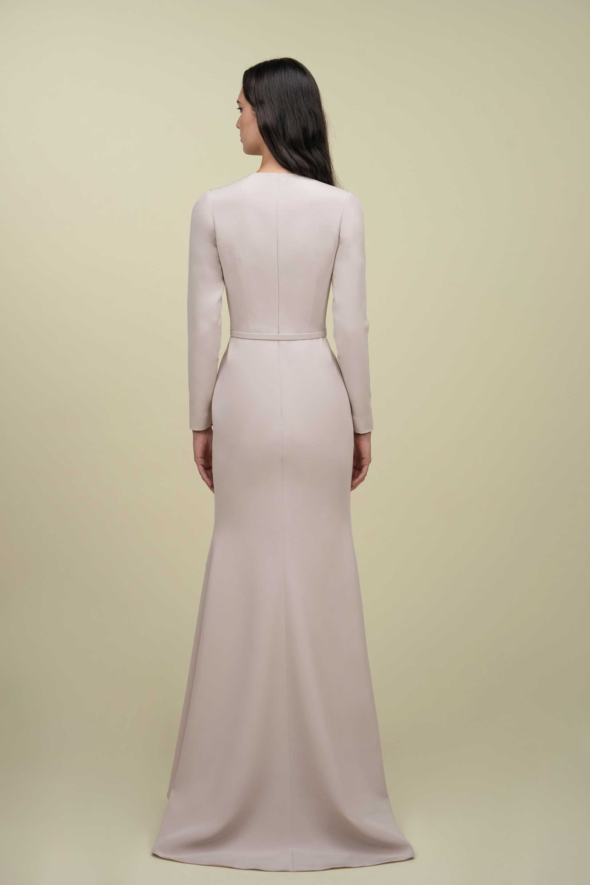 Sleek Gown With Deep Neckline And Intricate Embroidery