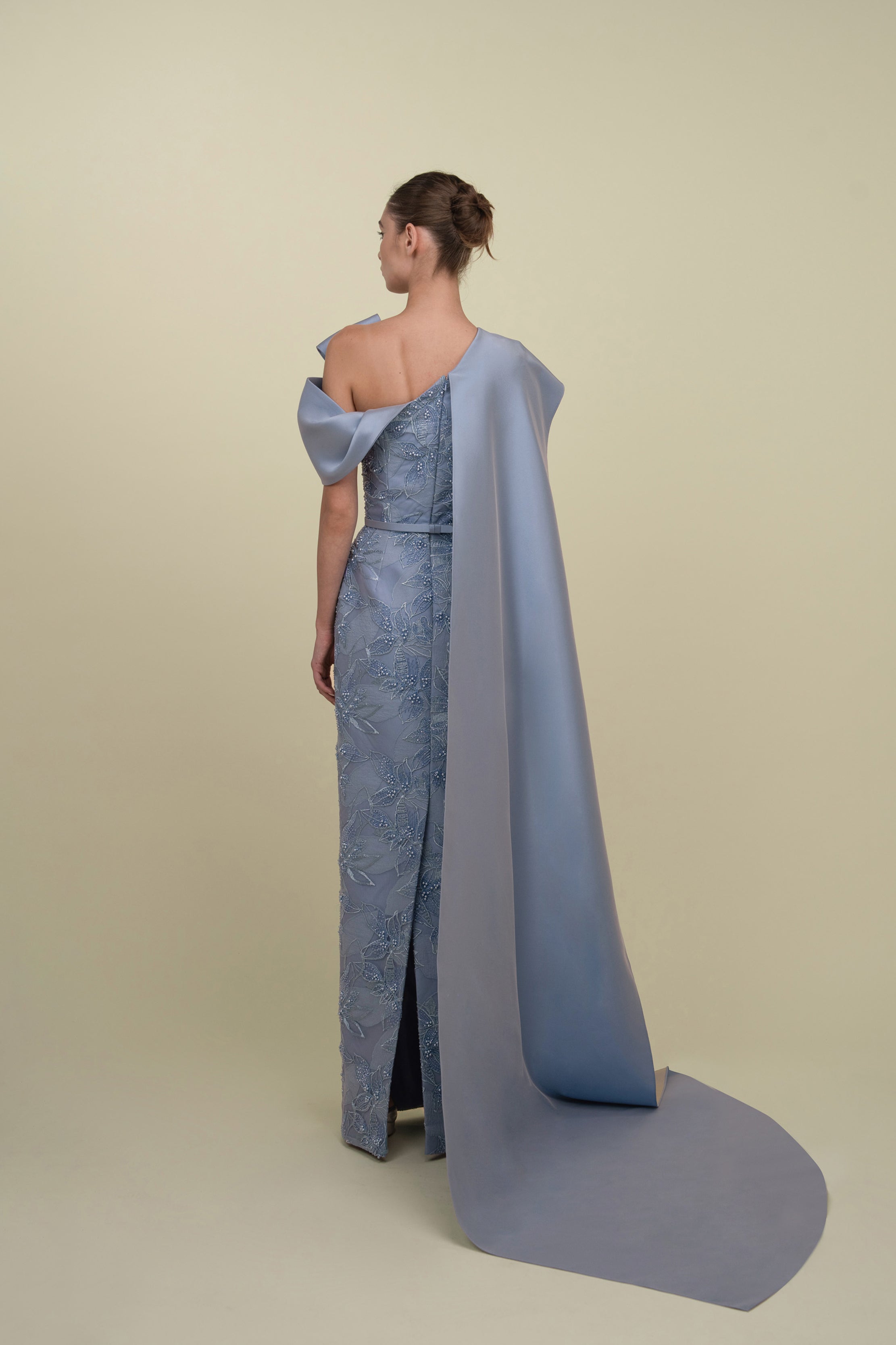 Embroidered gown with a cape