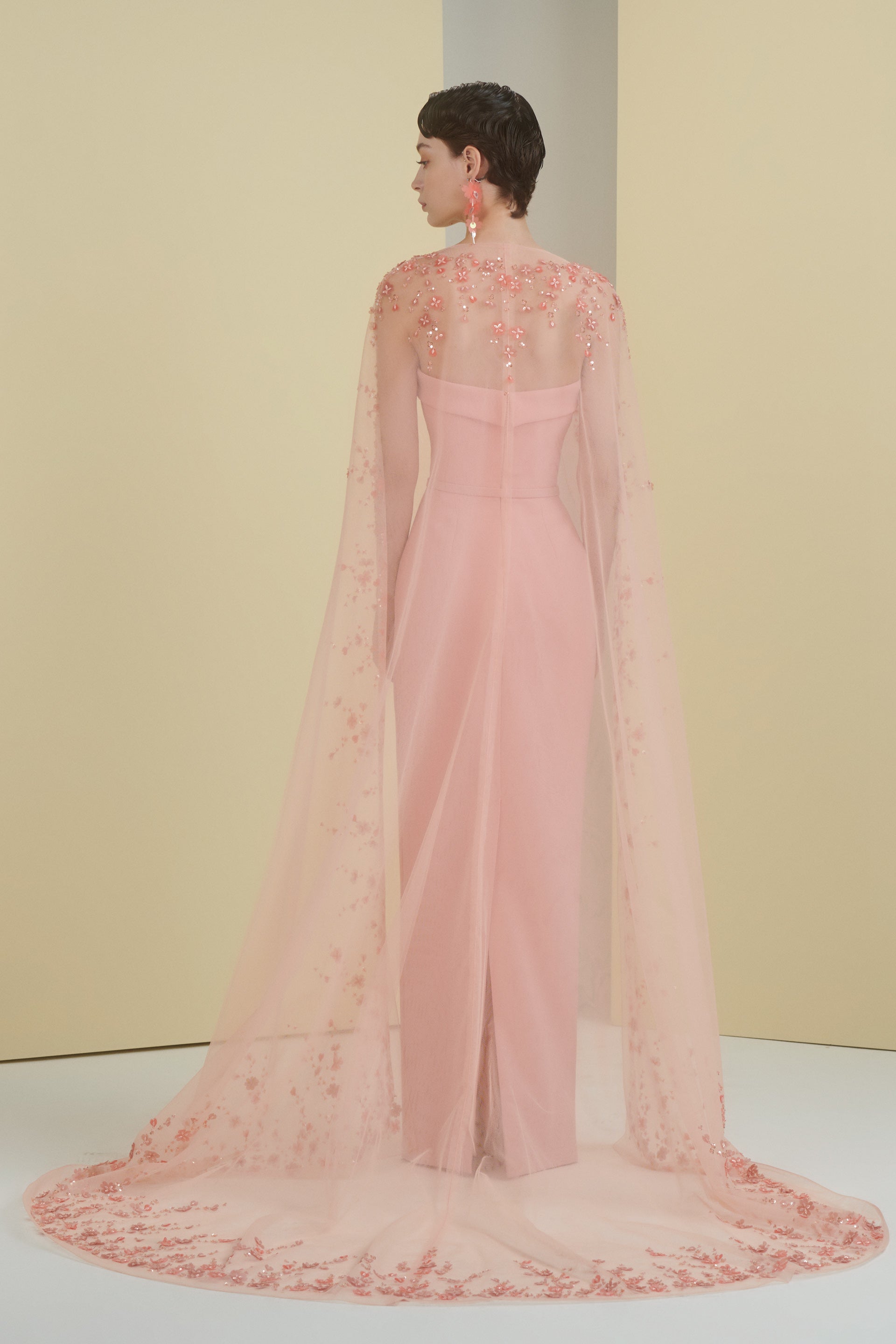 cape dress, column dress, beaded cape, cape, tulle cape, long dress, evening dress, full length, peach dress, mother of the bride, fitted dress, beading dress, 3d embellished dress, red carpet dress, strapless dress, ready to wear designer, evening dress Dubai, buy dress Dubai, fashion designer Dubai, SS24 collection, Spring summer collection, gala dress