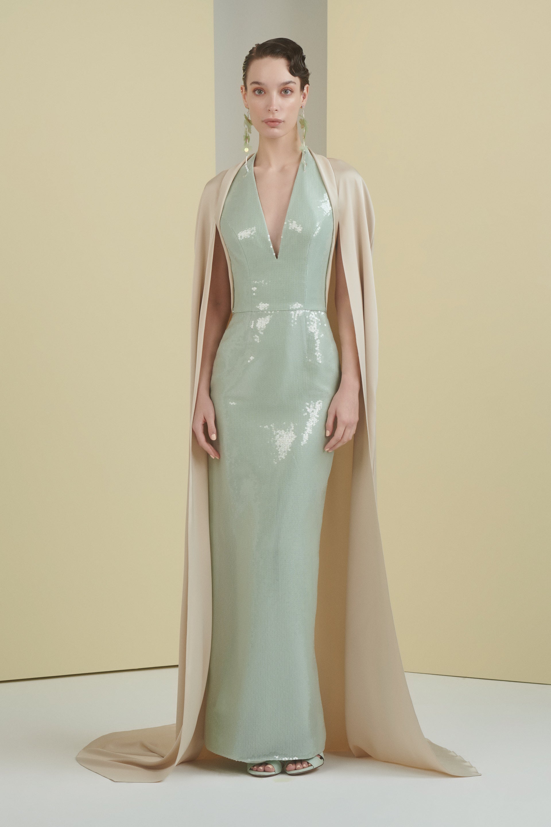 v neckline dress, column dress, sequin dress, green dress, satin cape, full length, cape dress, mother of the bride, long dress, evening dress, green dress, fitted dress, beading dress, red carpet dress, plunge neckline dress, ready to wear designer, evening dress Dubai, buy dress Dubai, fashion designer Dubai, SS24 collection, Spring summer collection, gala dress