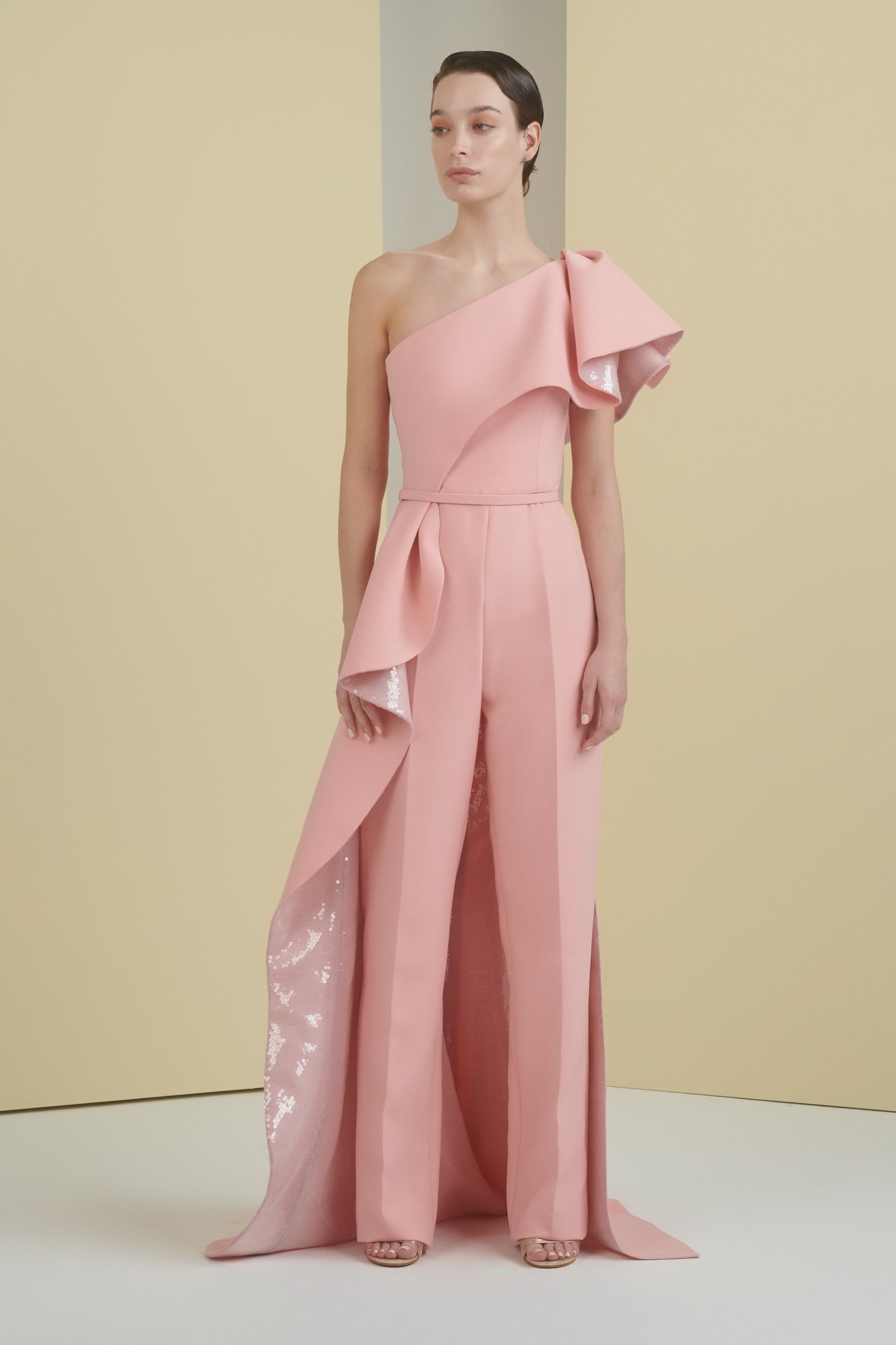peach jumpsuit, jumpsuit, asymmetrical jumpsuit, ruffle jumpsuit, asymmetrical neckline jumpsuit, colour block jumpsuit, sequin jumpsuit, party jumpsuit, ready to wear designer, jumpsuit Dubai, buy jumpsuit Dubai, fashion designer Dubai, SS24 collection, Spring summer collection, gala jumpsuit