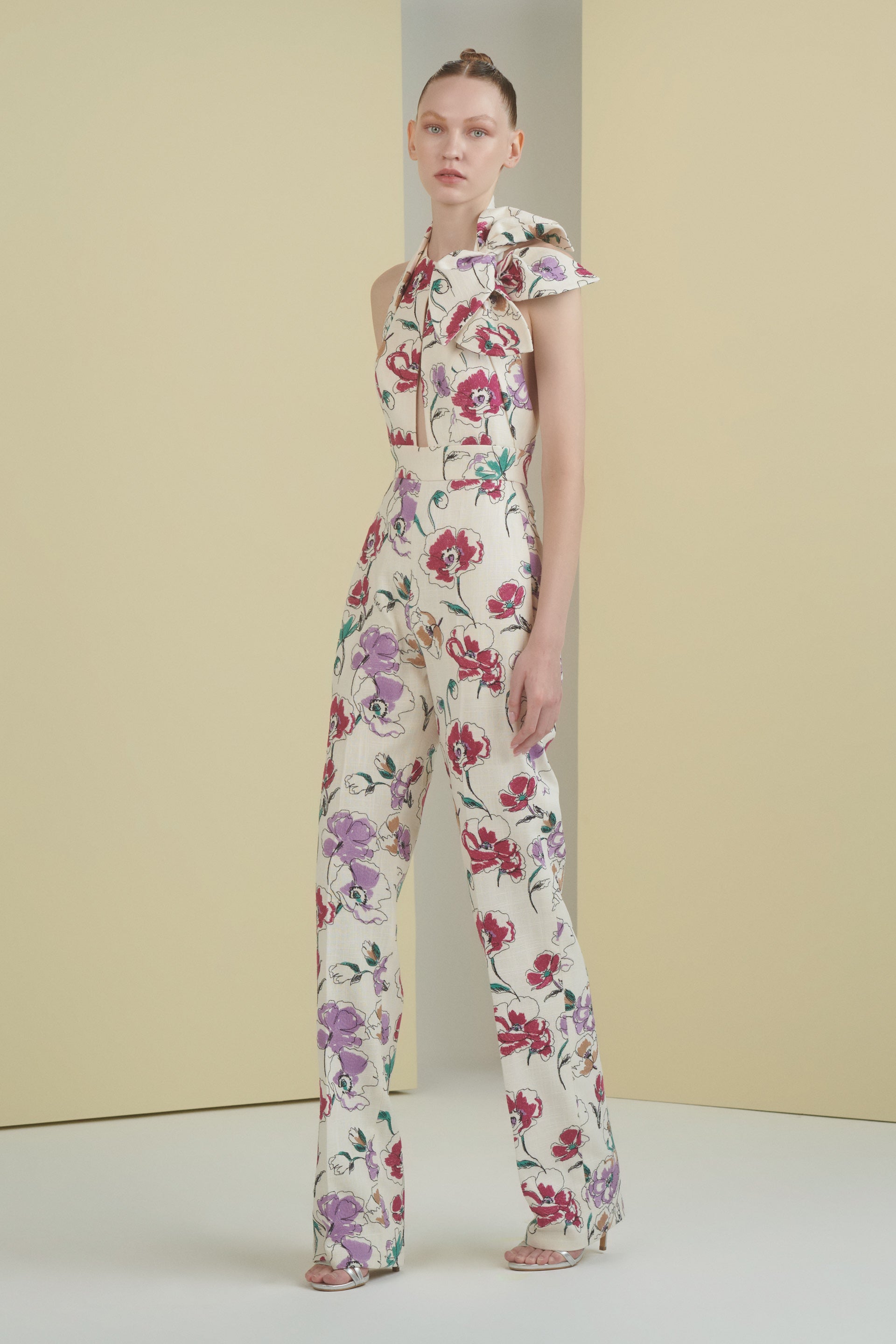 linen jumpsuit, floral, florals, embroidered linen, linen jumpsuit, halter neckline, cream, bow detail, backless jumpsuit, wide leg pant, ready to wear designer, evening dress Dubai, buy dress Dubai, fashion designer Dubai, SS24 collection, Spring summer collection, gala dress