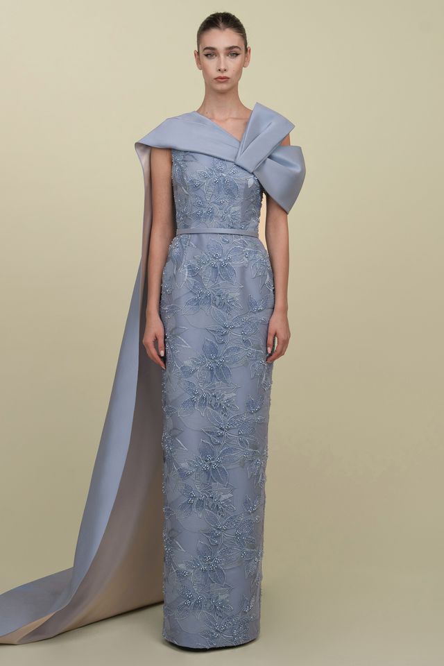 Embroidered gown with a cape