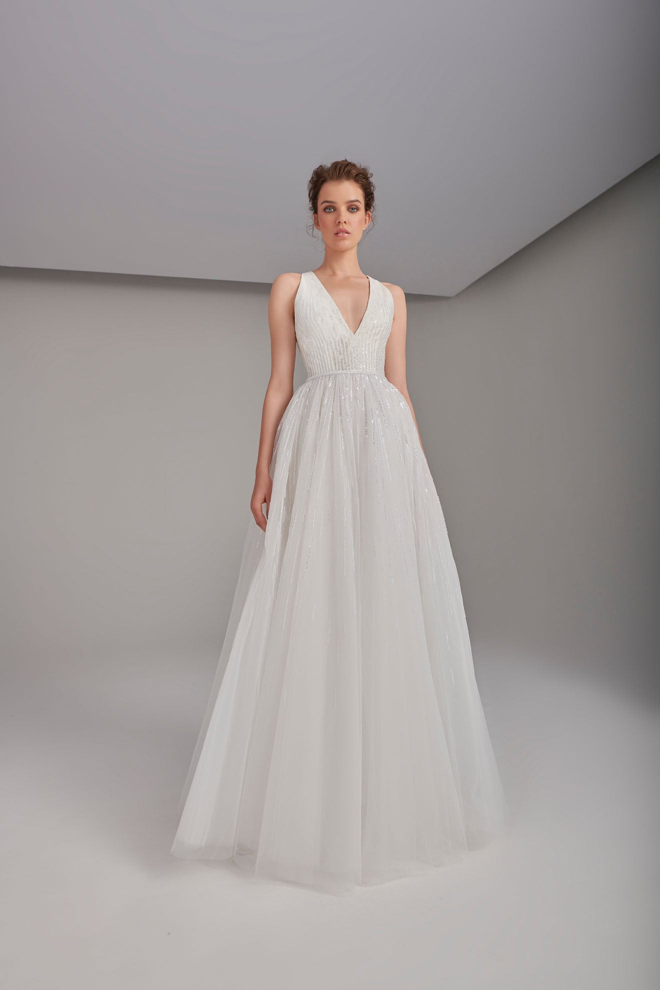 Luxury V-neckline tulle wedding gown with shimmery beads
